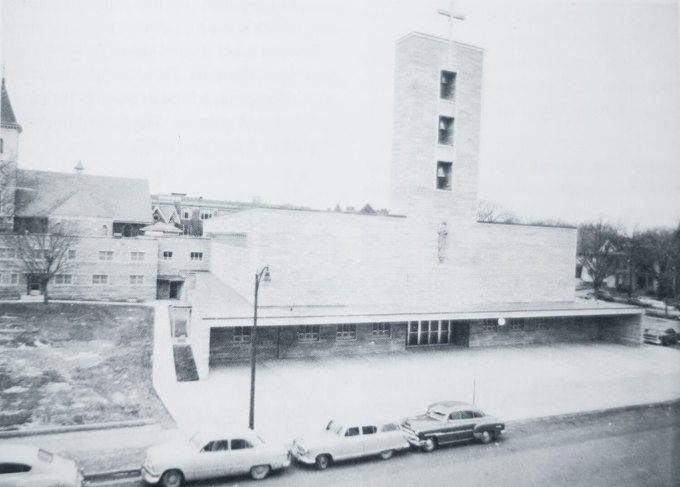Historical photograph: Saint John the Evangelist church exterior in Rochester, 1957; the present building later became a co-cathedral in 2018.